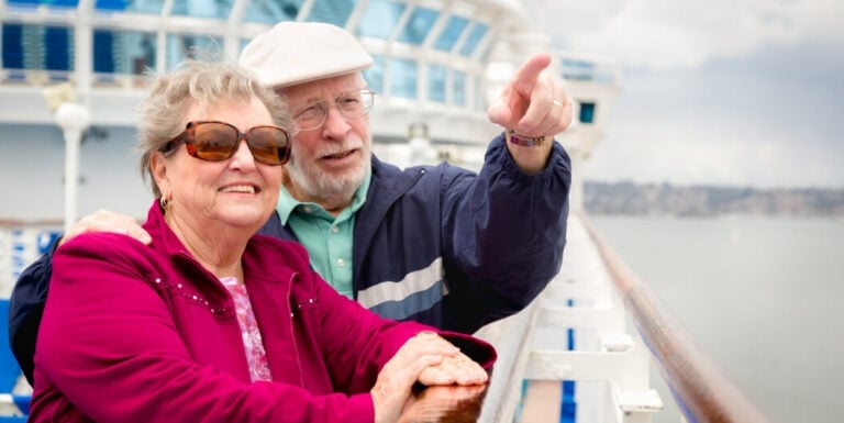 Elderly Couple Admiring the View aboard a River Cruise from Independent Living Facility