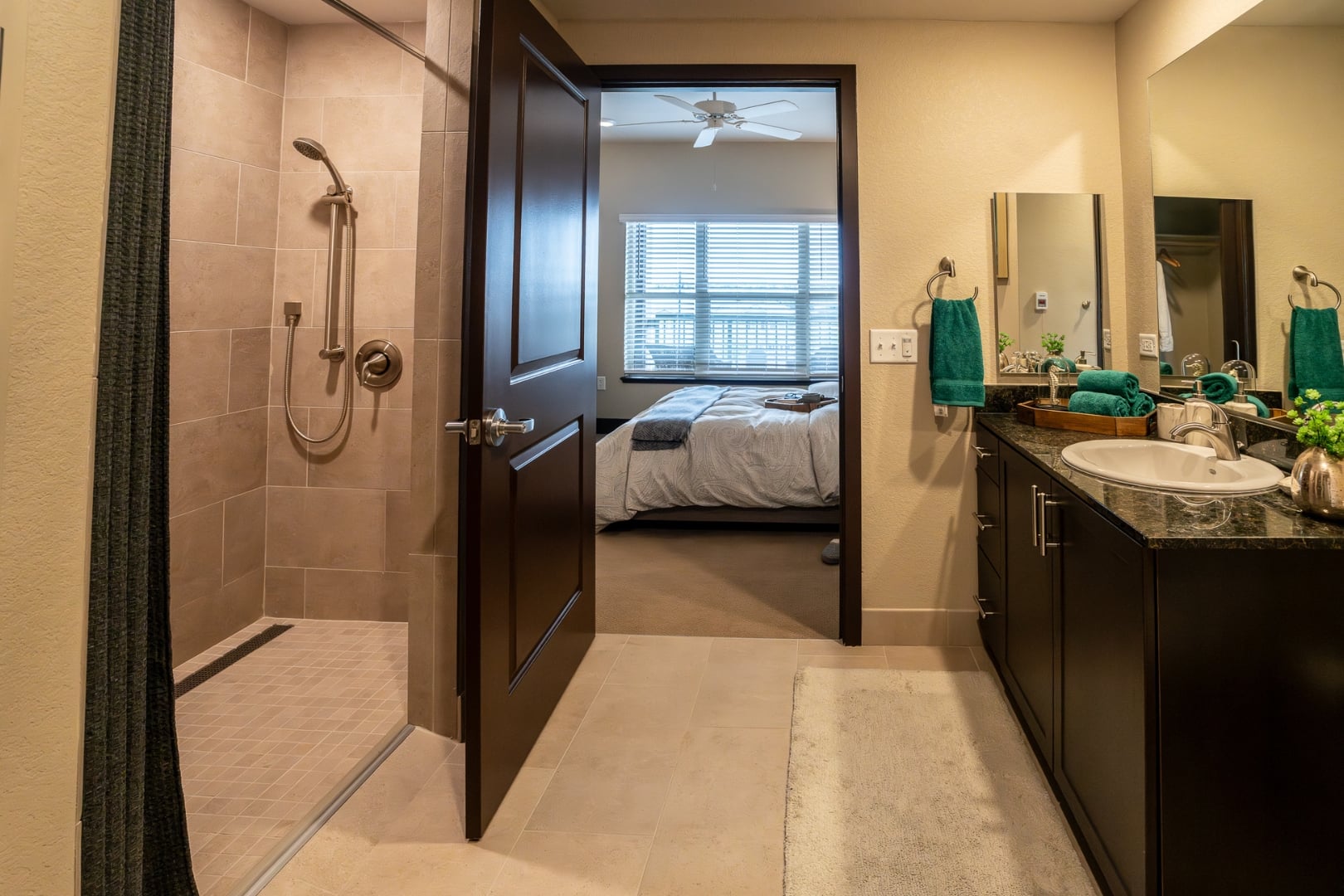 Walk-In Shower with View into Bedroom at Independent Living Facility