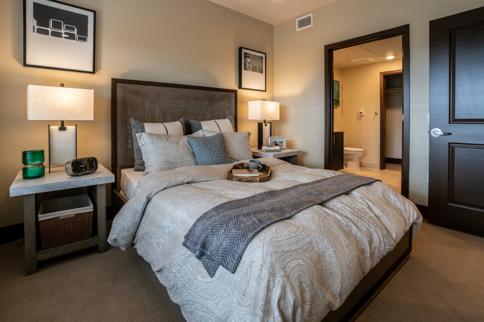 Bedroom with Bed and Nightstand Lamps at Independent Living Facility