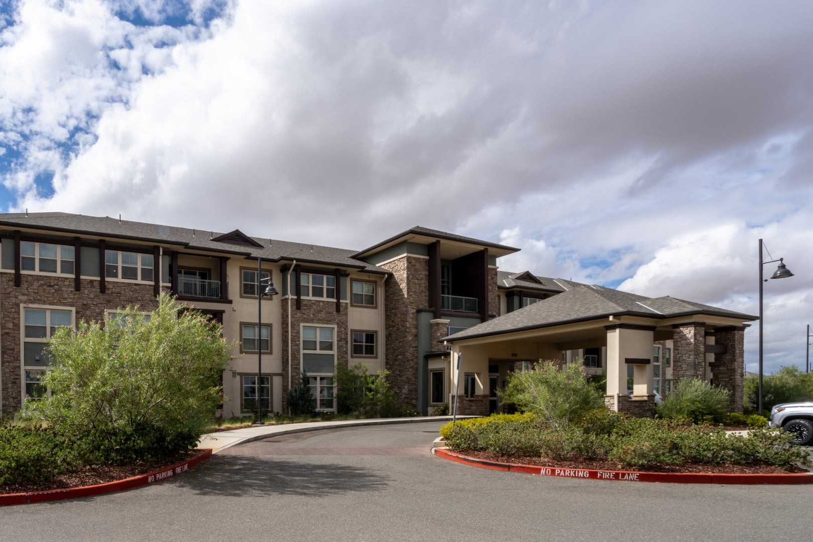 Covered Entryway with Landscaped Walkway at Independent Living Facility