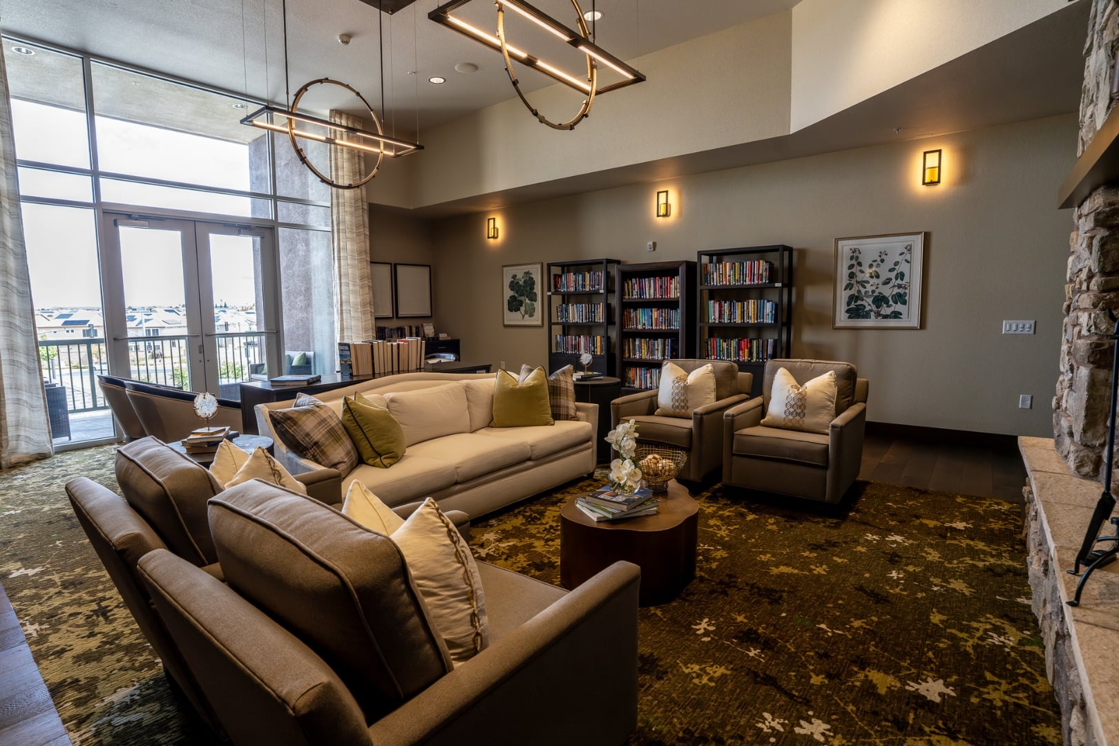 Cozy Library Lounge with Bookshelves at Independent Living Facility