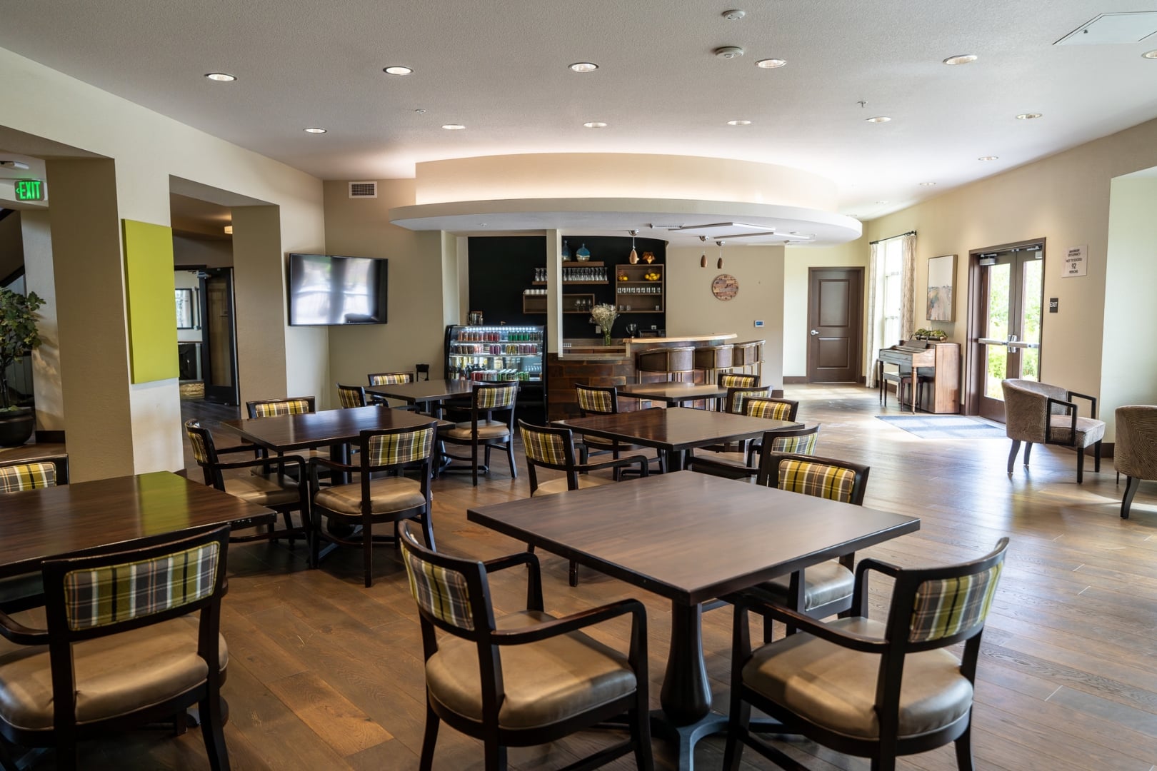 Bistro Lounge with Bar and Seating at Independent Living Facility