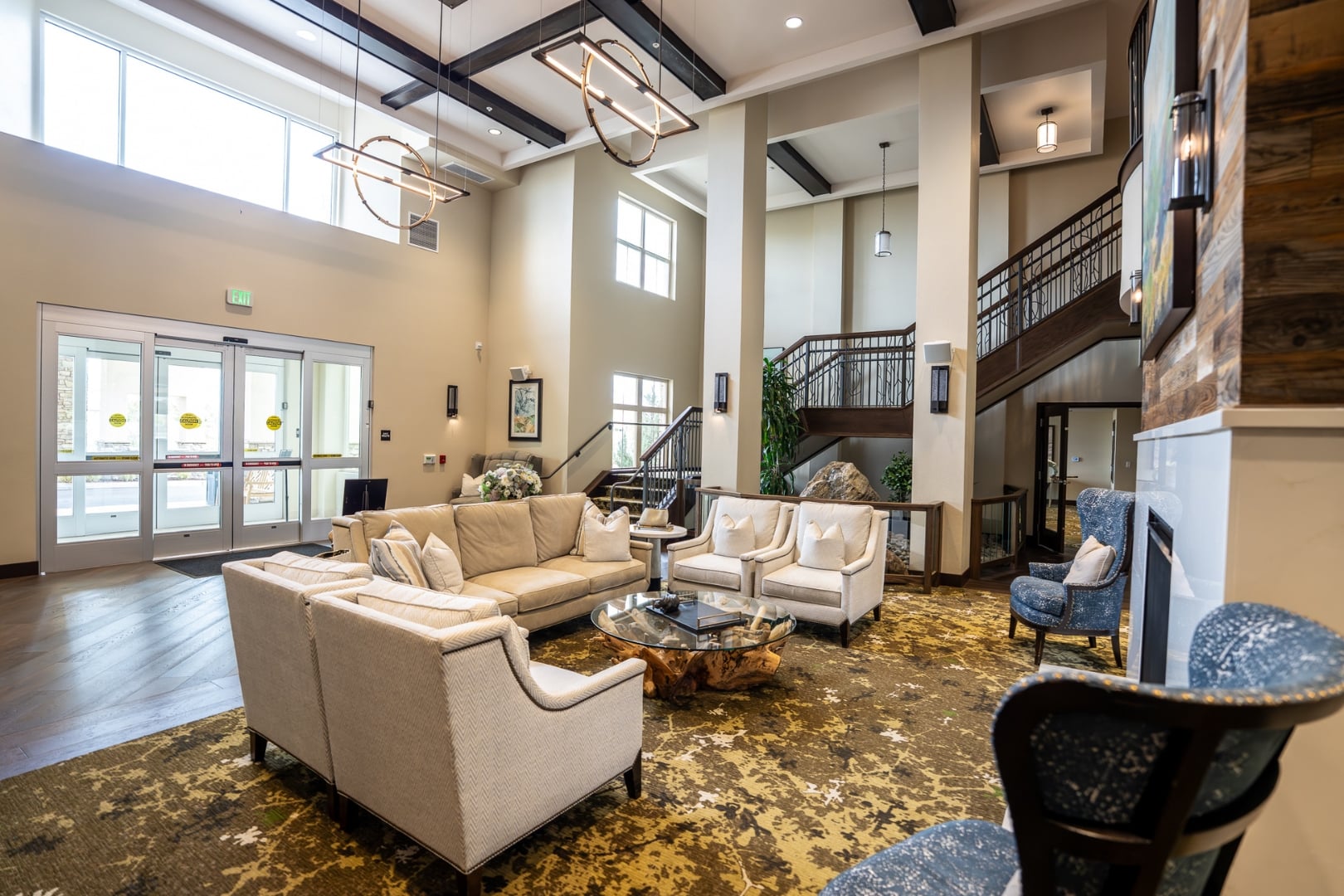 Two Story Lobby with Cozy Seating at Independent Living Facility