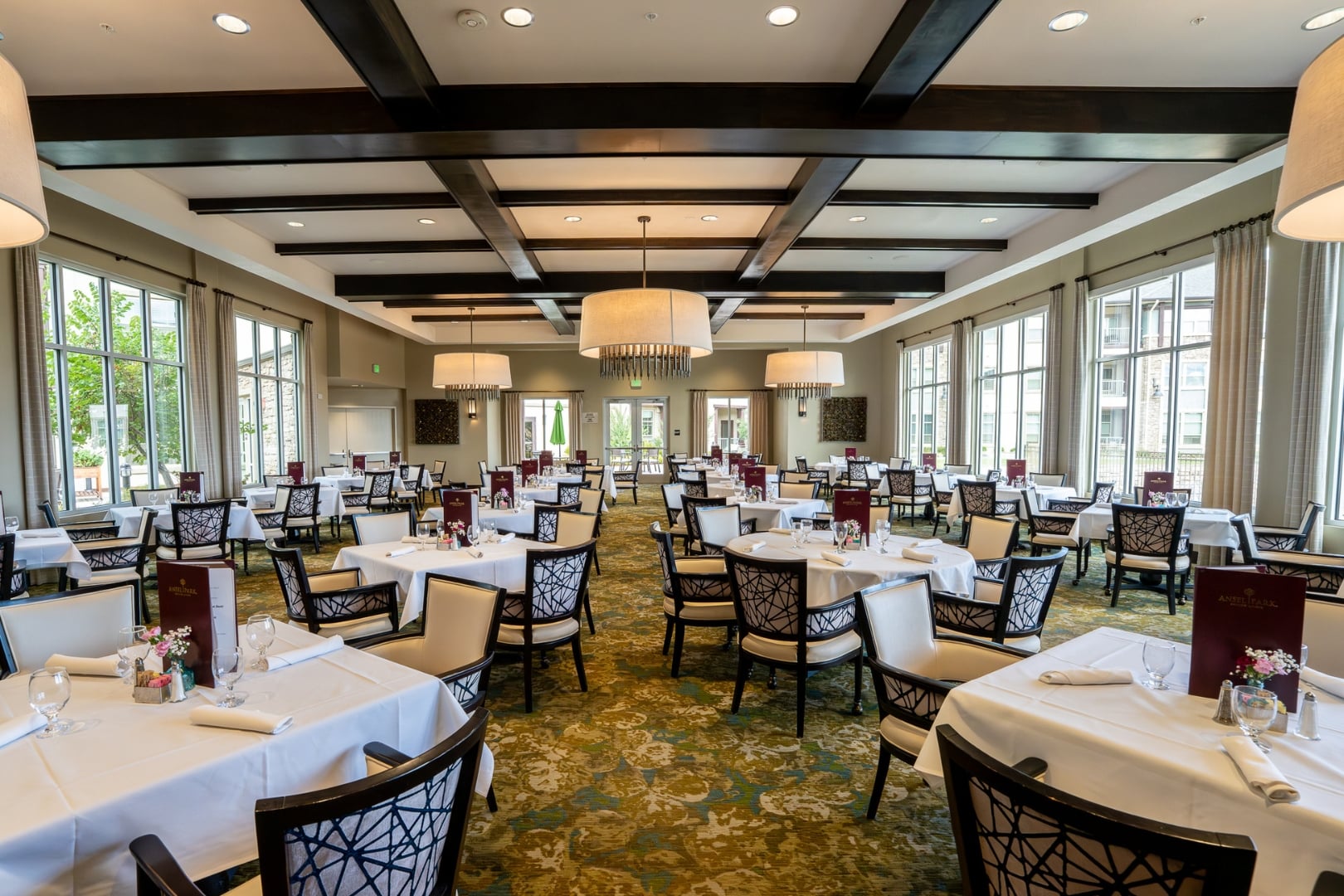 Dining Room Set with White Linens at Independent Living Facility