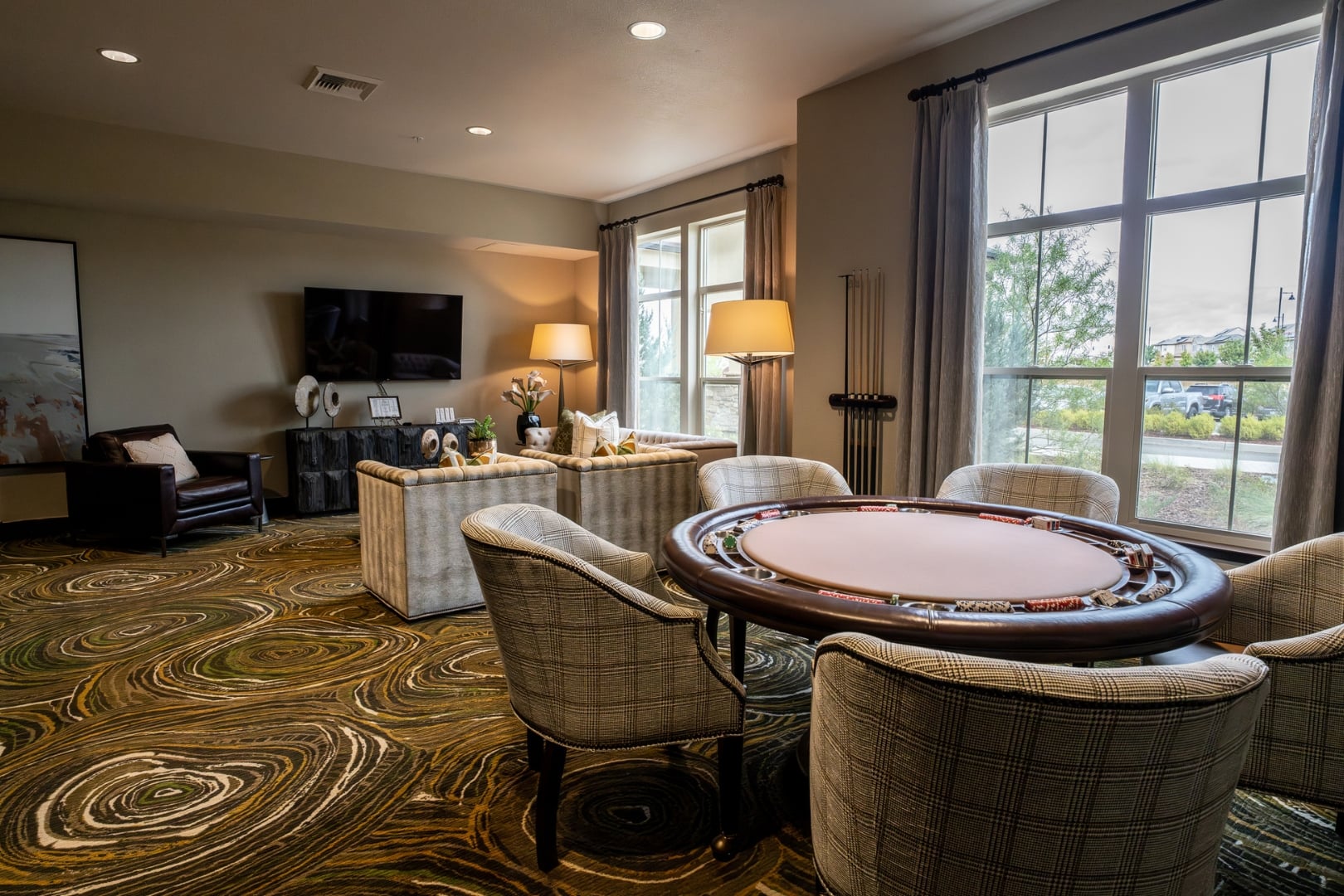 Poker Table Seating in Game Room at Independent Living Facility