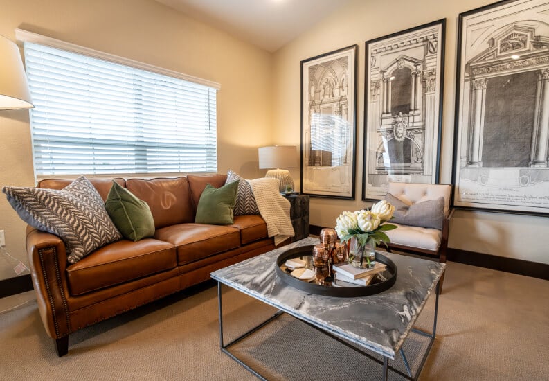 Cozy Living Room with Leather Sofa at Independent Living Facility Cozy Living Room with Leather Sofa at Independent Living Facility